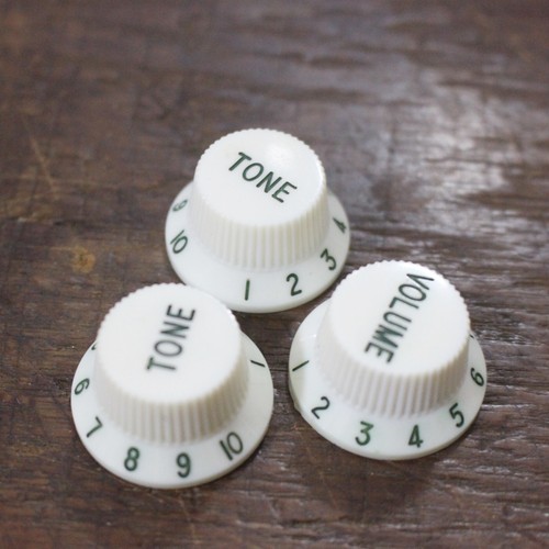 Vintage Style Knobs For USA Strat - Aged White with Green Font