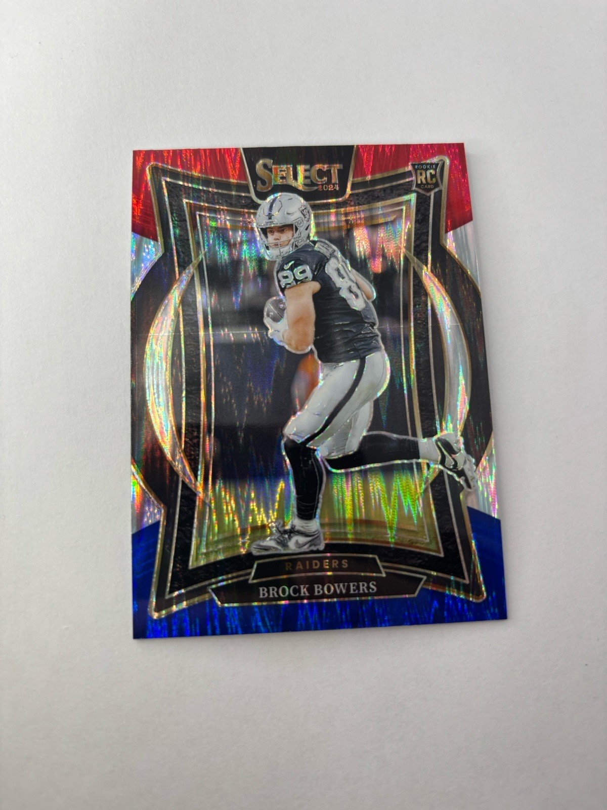 2024 Panini Select - Concourse Brock Bowers #31 Red & Blue Shock Prizm Rookie SP