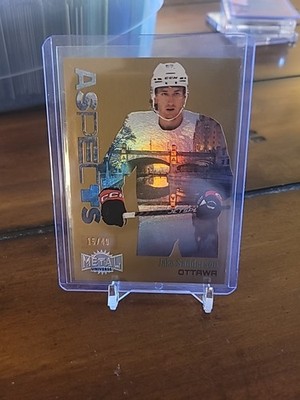2022-23 Metal Universe Gold Aspects Jake Sanderson RC 15/49 Ottawa Senators A-24