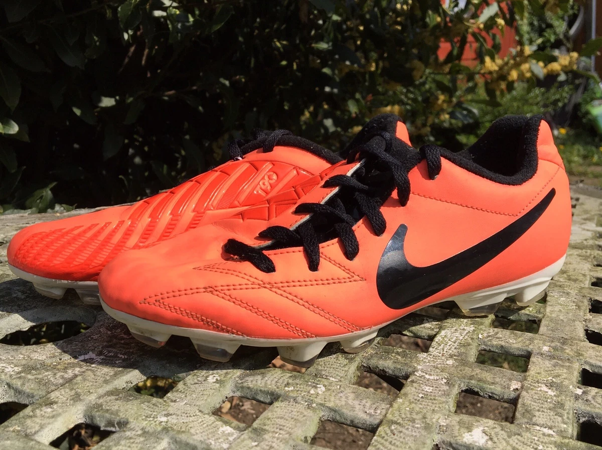 Orange football store boots nike
