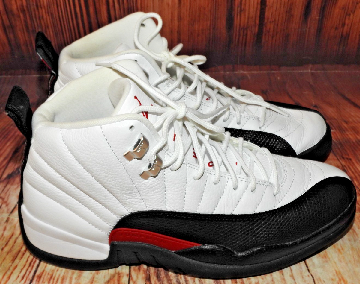 Men's 7.5 , Women's 9 Nike Air Jordan 12 Retro Taxi Flip Black