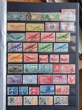 100 timbres oblitérés de la poste aérienne des Etats-Unis.