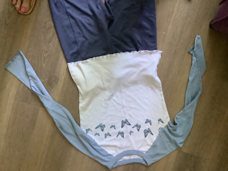Girls size 14 blue pants & blue butterfly’s top with lettuce sleves and bottom 