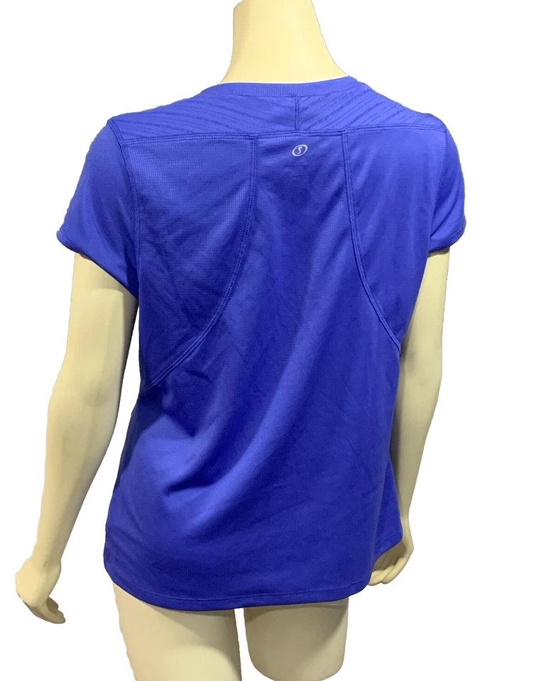 Camisa Spalding para mujer verde mediana Speed-Dri ropa deportiva cuello en V manga corta Foto 2 de 4