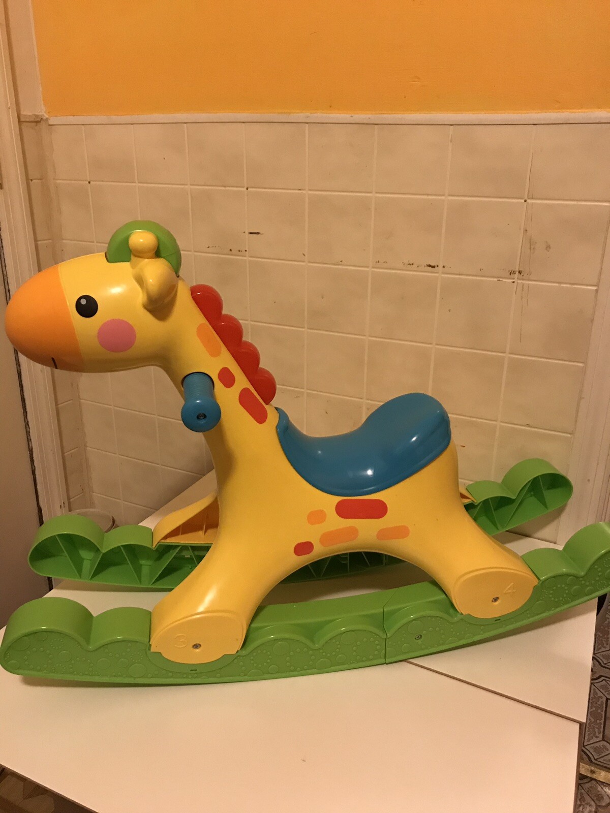 fisher price ride on giraffe