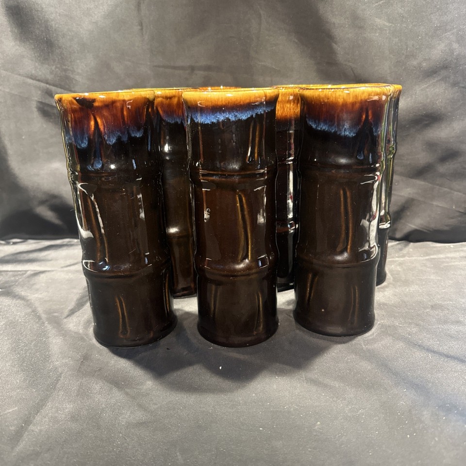 Eight matching Libbey bamboo tiki mugs in rare black/brown/blue colorways — a complete vintage set that instantly transforms any home bar into a tiki lounge.
