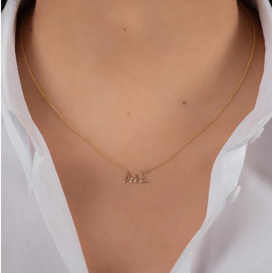 Couple pendant in gold outlet