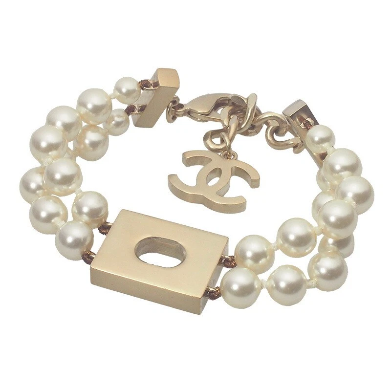 AUTENTICO BRACCIALE CHANEL PERLE FINTE MARCHIO COCO PLACCATO ORO B17B DONNA F S