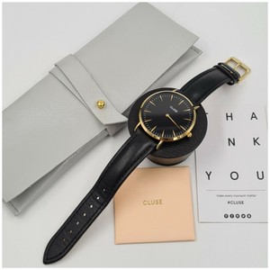 montre CLUSE E52405 bracelet cuir noir boîtier doré fond noir pochette  notice | eBay