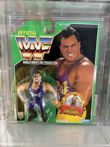 WWF HASBRO EVIL CRUSH MOC IN ACRYLIC CASE...