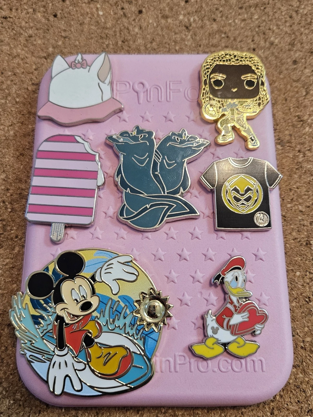 Disney 7-pin trading pack with pin board.