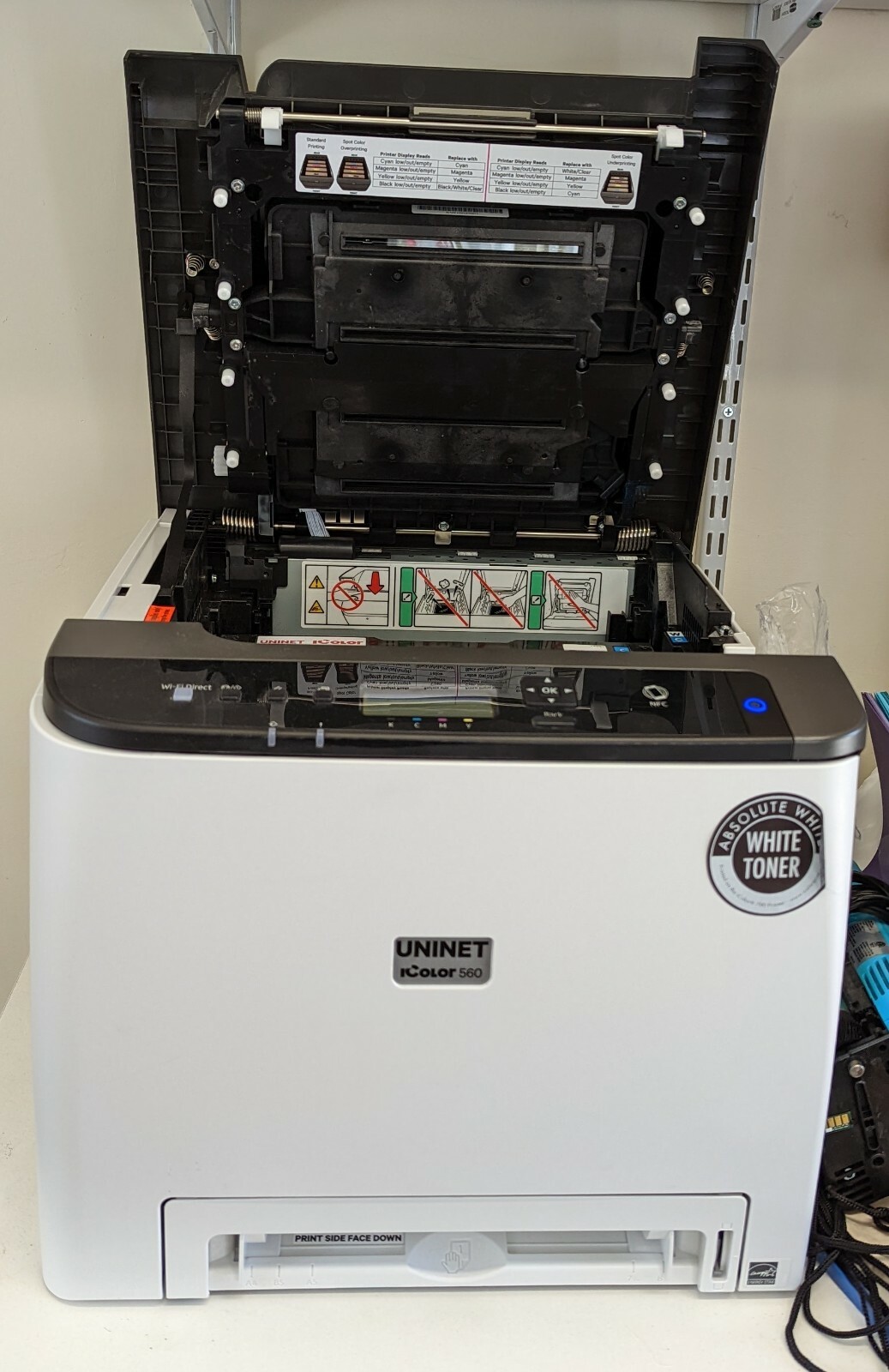 White toner transfer printer. Printer for garment and other materials