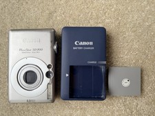 Canon PowerShot SD300 Digital ELPH PC1101 with Battery Charger And Battery