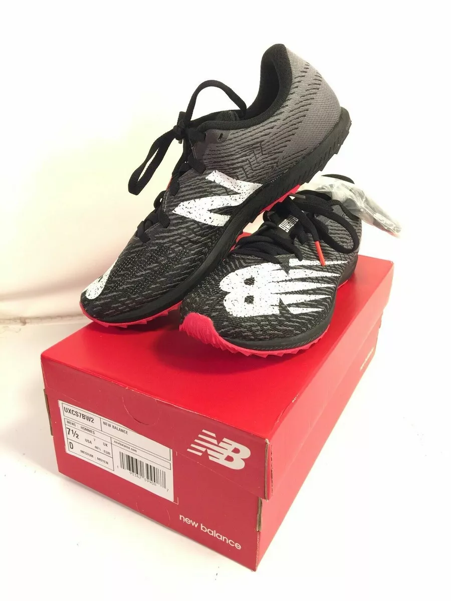 New balance spike cleats top