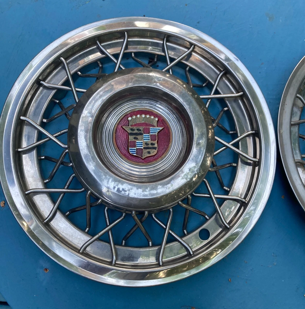 Cadillac wire hubcaps deals