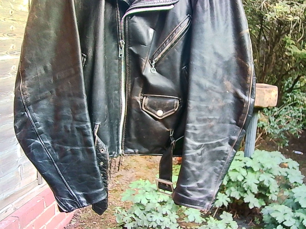 CHAQUETA DE CUERO SCHOTT PERFECTO 118 TALLA 40, DAÑOS BIEN DESGASTADOS, PUÑOS DIVIDIDOS.