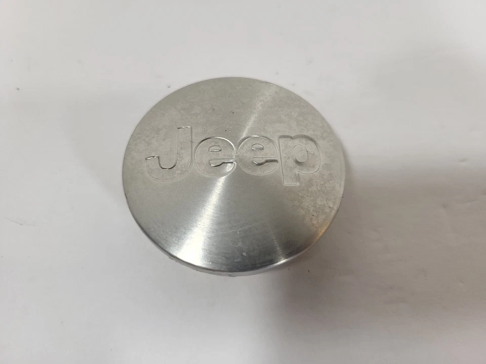 Tapa central de rueda OEM JEEP COMMANDER, LIBERTY, PATRIOT, WRANGLER 52090402AA #2C-1 Foto 2 de 4