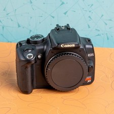 Canon EOS Rebel XT DSLR Camera Body with 3 Batteries, Charger, and 16 GB card
