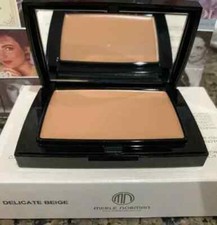 Merle Norman Total Finish....  Shade is DELICATE BEIGE....NEW