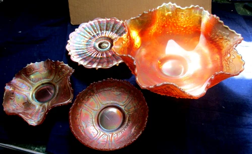 4 PIECES ANTIQUE CARNIVAL GLASS, ORANGE TREE, SAILBOAT AND STIPPLED RAYS