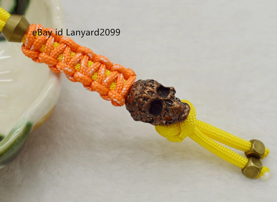 Cuchillo calavera de cobre cordón cuentas cuentas paracord hecho a mano cordón colgante Foto 2 de 4