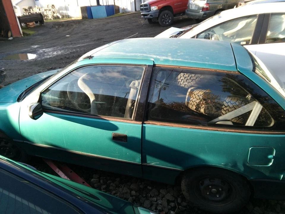 Regulador de ventana de puerta delantera izquierda usado se adapta a: 1993 Geo Metro 2 puertas delantero izquierdo Foto 4 de 4