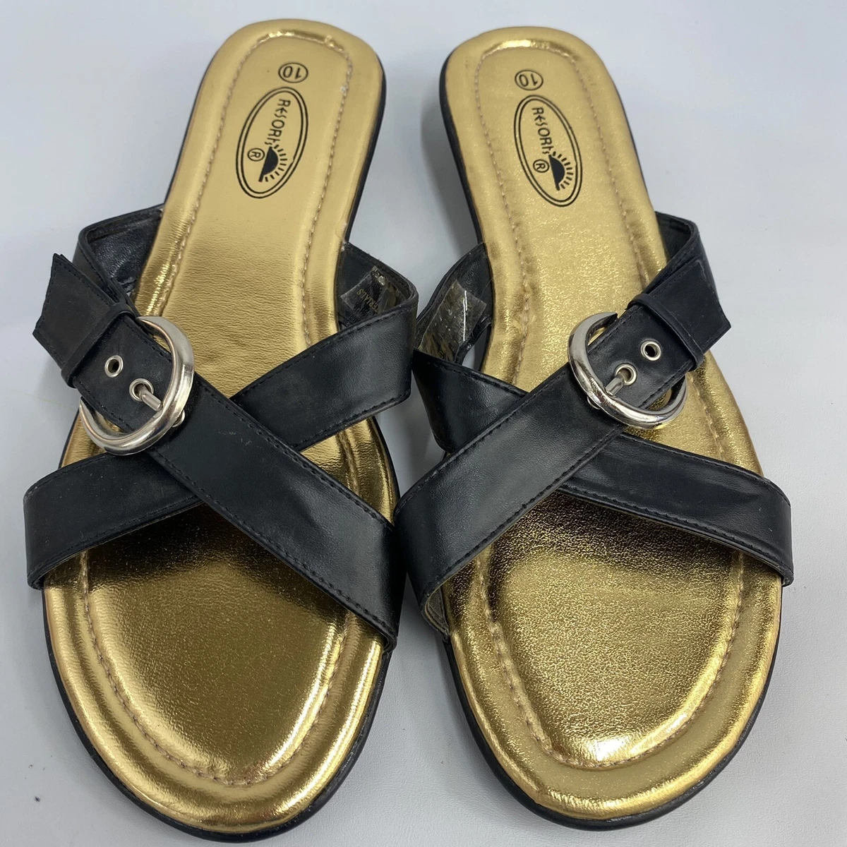Black and cheap gold flip flops