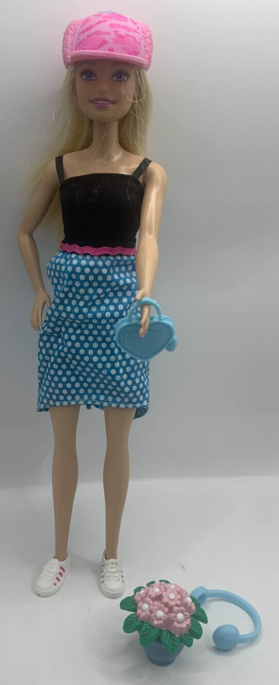 Modern Fashion Barbie Doll with Blonde Hair and Polka Dot Floral Dress