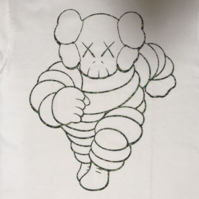 Kaws × BAPE Michelin Man chum T-shirt White A Bathing Ape Kaws × BAPE Michelin Man chum T-shirt White A Bathing Ape