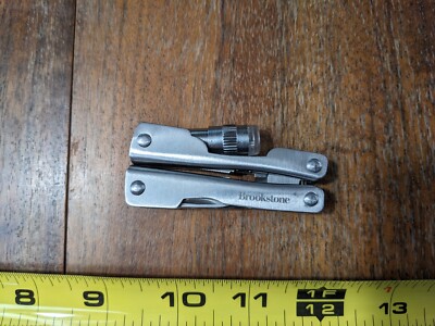 Brookstone Pocket Knife Multi 7+ Function Tool Led Light Key Compact Mini Pliers
