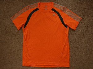 orange athletic shirt