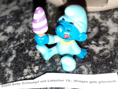 20206 Baby Schlumpf mit Lutscher (Kragen gelb glänzend) Schlumpf Schlümpfe