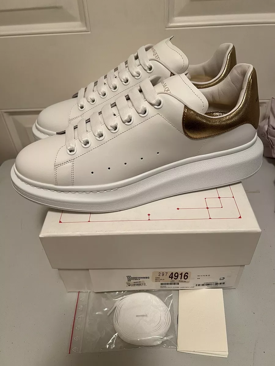 Alexander Mcqueen Womans White Leather And Gold Heel Tab Oversize Sneakers  | Smart Closet