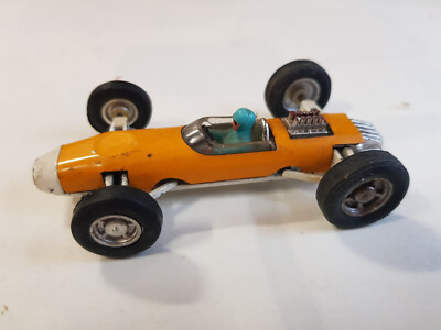 K-54: Marx Toys Hong Kong: Rennwagen mit Fahrerfigur orange/weiss [1]