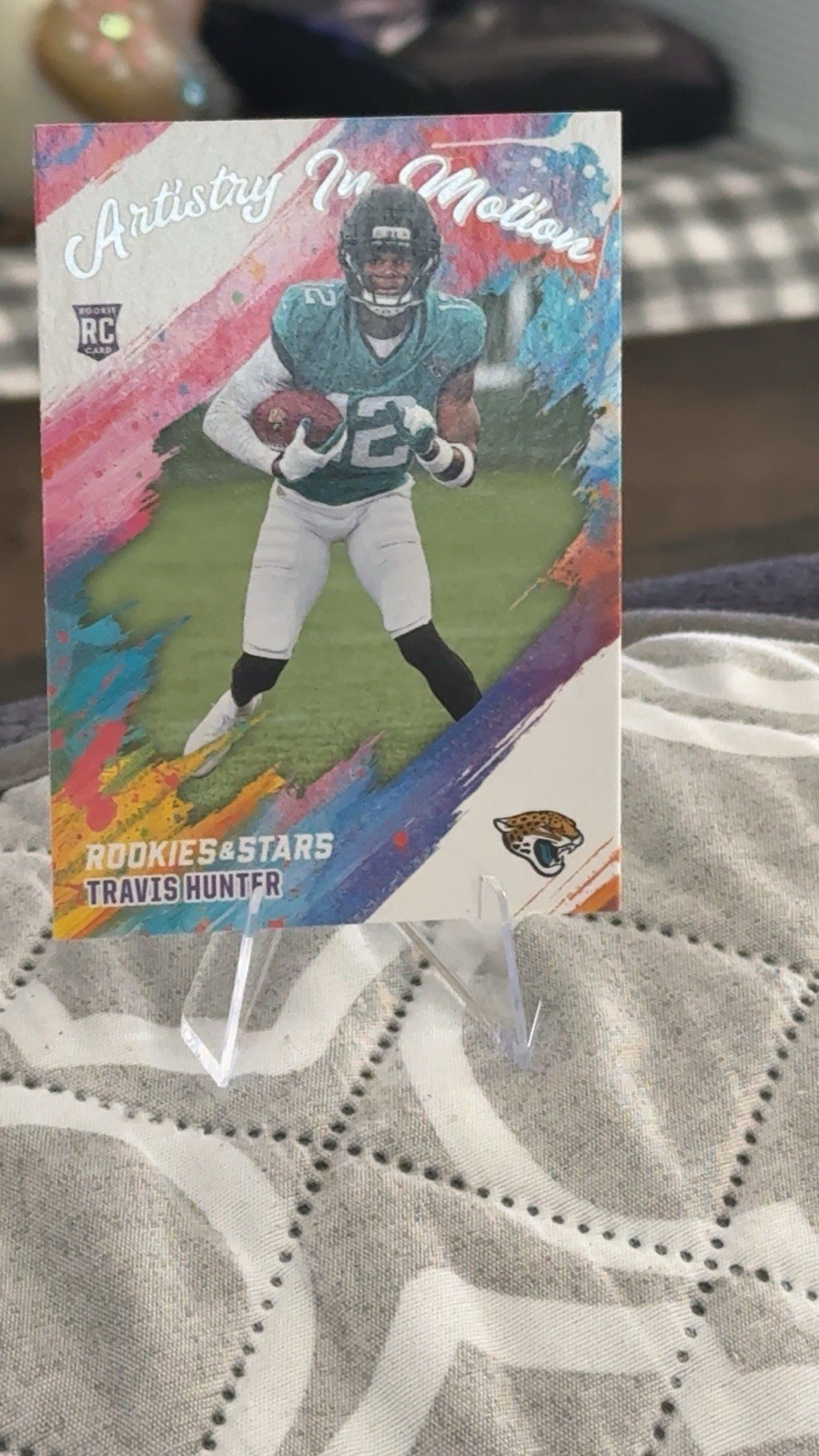 2025 Panini Rookies & Stars - Travis Hunter Artistry In Motion #8 (RC)