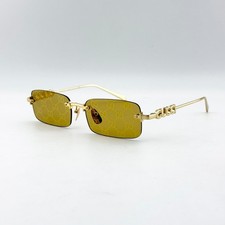 Gucci GG1808S Rimless Gold Frame Gold GG Monogram Lens Sunglasses 52mm