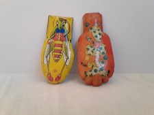 Set Of 2 Vintage Metal Noise Makers USA Cricket Clown