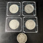 5 Morgan Silver Dollars. 1889, 1921, 1886, 1901 And 1882.