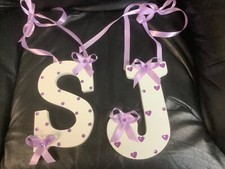 1 white Decorated wooden letter with lavender  J or S  1/4  thick 8 3/4  L, 7W