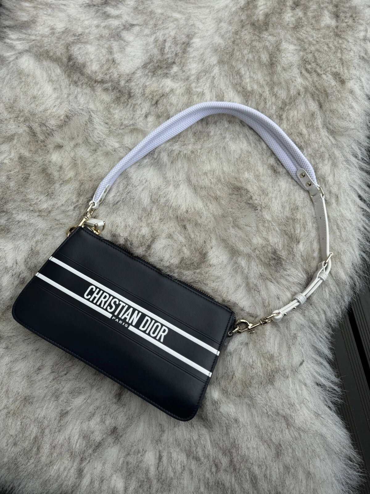 Pochette CHRISTIAN DIOR Vibe en veau Dior Bleu Petit côté cuir CD