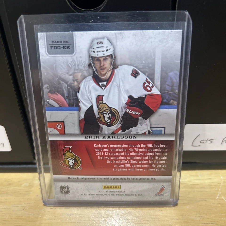 2012-13 Panini Certified - Fabric of the Game #FOG-EK Erik Karlsson /299 (MEM) - Image 2 of 2