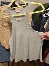 Free People Flowy Gray Racer Back Tank. Size small. PTP 17  .