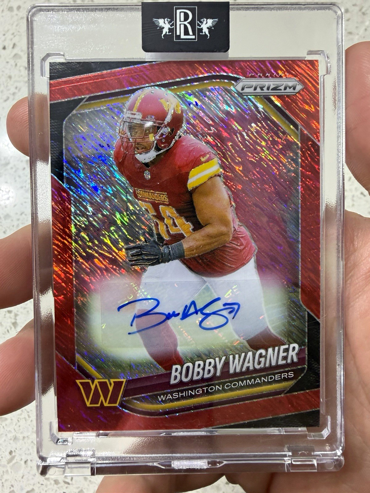 2025 Panini Prizm Bobby Wagner #261 Red Shimmer Prizm Auto /35 Commanders