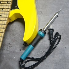 Musical instrument repair and welding of electric guitar internal circuits