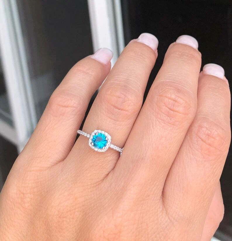 Round Cut Blue Topaz Halo Style December Birthstone Ring 14K White