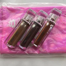 About face beauty by Halsey Light Lock lip gloss bundle + free makeup bag 