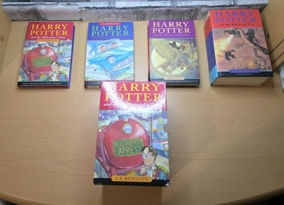 Harry Potter Books 1-4  Its Magic! Hardbacks Bloomsbury  Good Condition