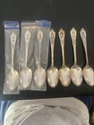 7 Wallace Sterling Silver Spoons