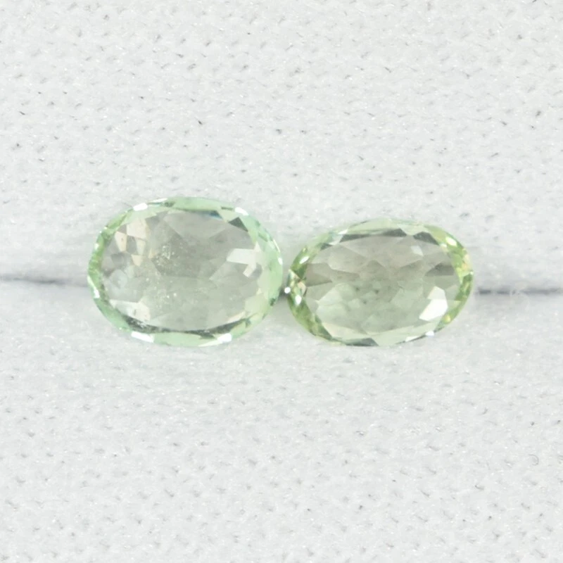 0.60 ct RARE COLLECTOR'S MINT GREEN NATURAL KORNERUPINE  Oval 2pc See Vdo ON - Image 2 of 3
