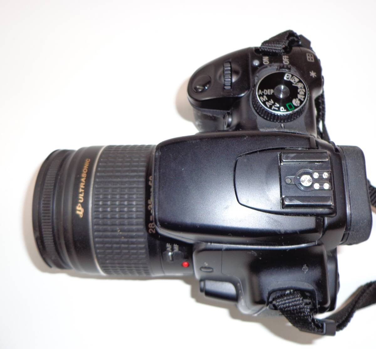 Canon EOS Kiss Digital X DSLR Camera with 28-80mm Zoom Lens